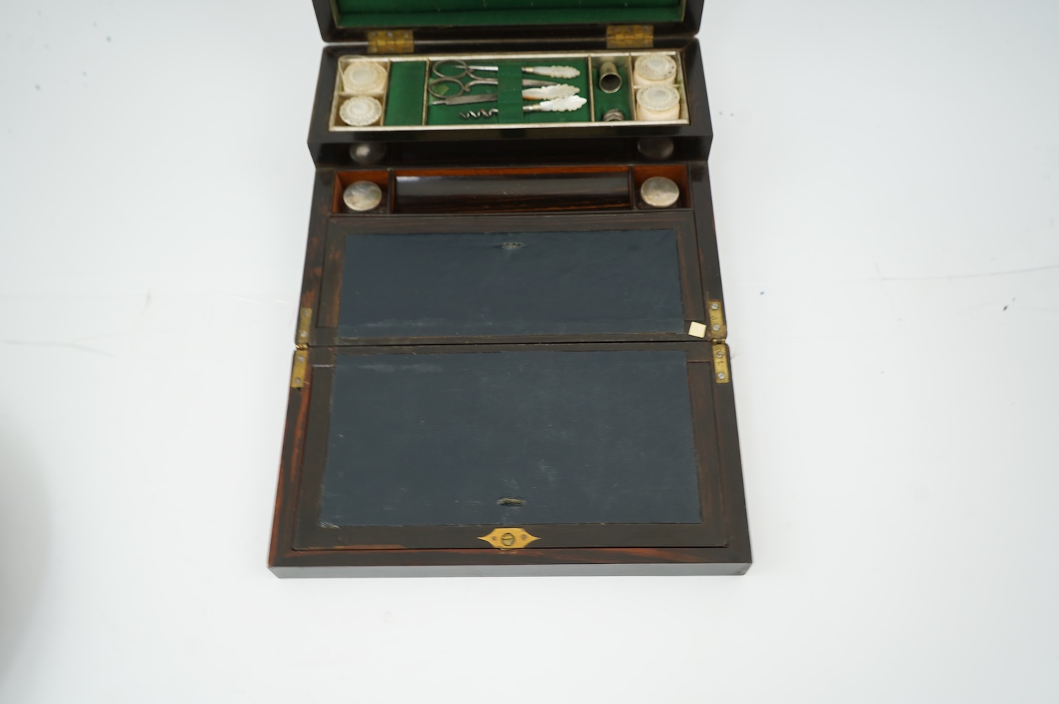 A mid 19th century rosewood writing and sewing box